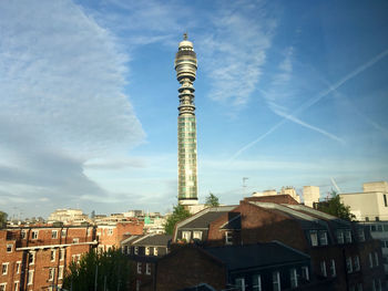 Low angle view of buildings against blue sky