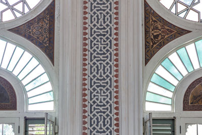 Low angle view of ornate window in building