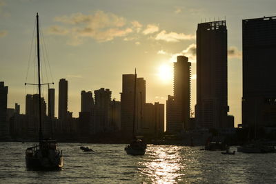 View of skyscrapers at sunset