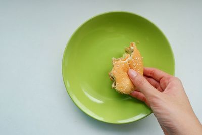 Close-up of hand holding bread