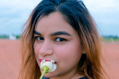 Close-up portrait of a beautiful young woman