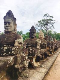 Statue against temple