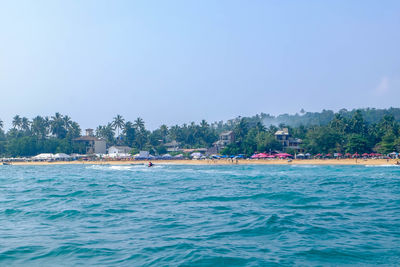 Scenic view of sea against clear sky