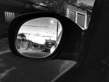 Reflection of car on side-view mirror