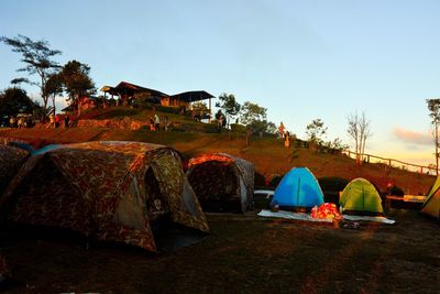 Tent in park against sky