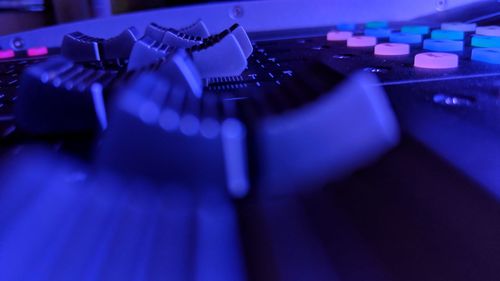 Close-up of illuminated sound recording equipment