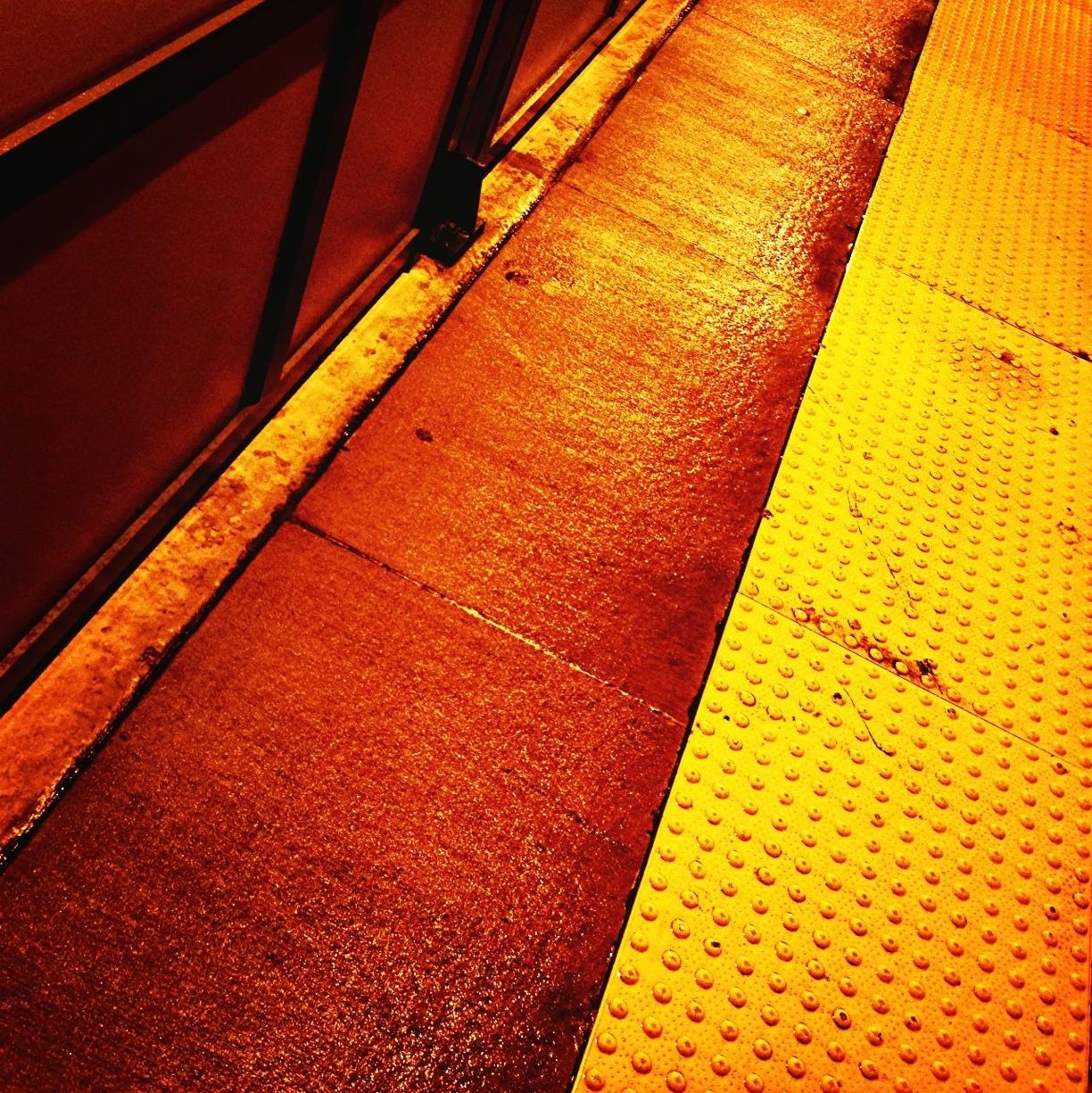 architecture, built structure, yellow, building exterior, steps and staircases, low angle view, steps, pattern, orange color, wall - building feature, indoors, staircase, railing, no people, building, shadow, high angle view, text, sunlight