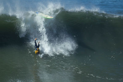 Man surfing in sea