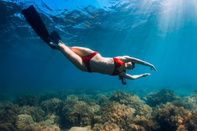 Man swimming in sea