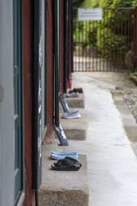 Footwear on steps by building