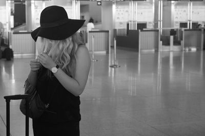 Young woman wearing hat