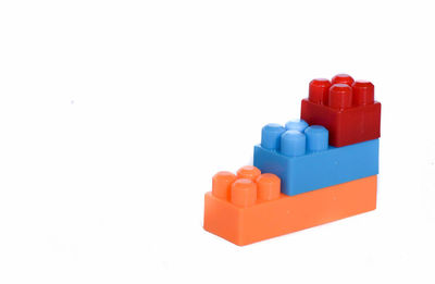 Stack of toys against white background