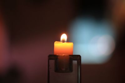 Close-up of illuminated candle