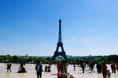 Tourists in front of building