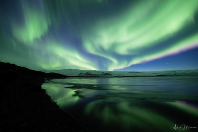 Scenic view of sea against sky at night