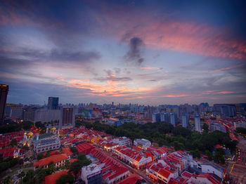 Cityscape against sky during sunset