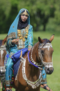 Portrait of woman riding