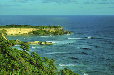 High angle view of sea shore against sky