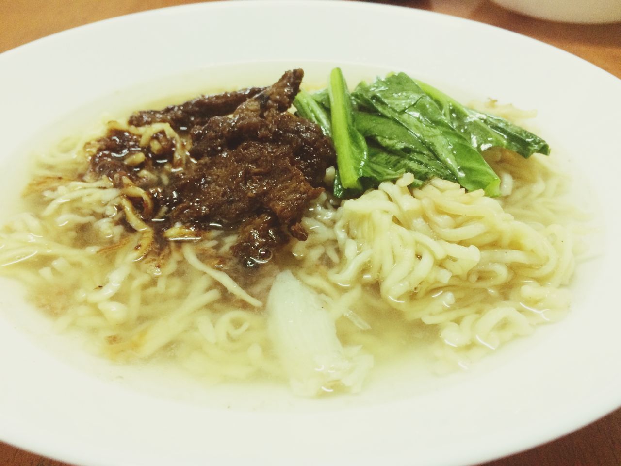 CLOSE-UP OF RICE WITH NOODLES IN BOWL