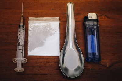 High angle view of glasses on table