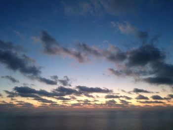 Scenic view of sea against sky at sunset