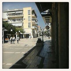 People walking on city street