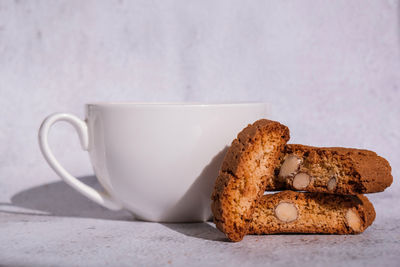 Close-up of coffee cup on table