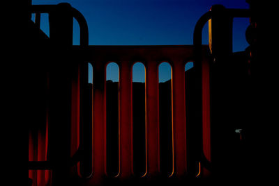 Close-up of silhouette built structure against the sky