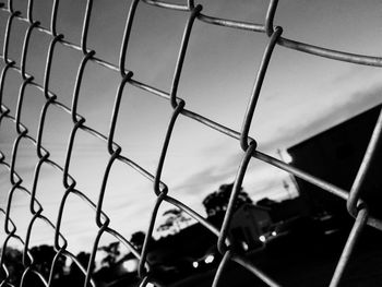 Low angle view of chainlink fence