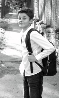 Portrait of young man standing outdoors