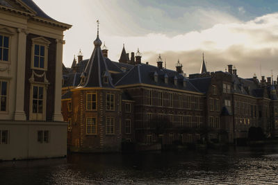 Buildings against sky during sunset