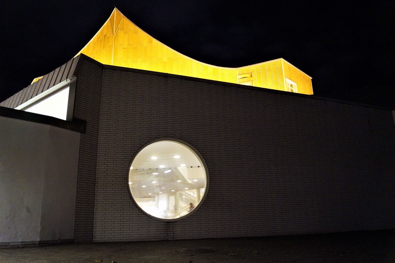 yellow, low angle view, no people, architecture, sky, indoors, night