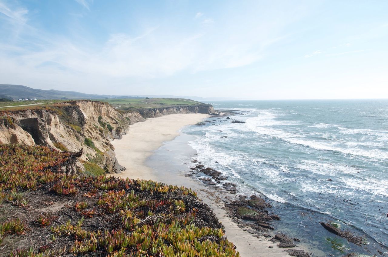 sea, water, horizon over water, scenics, tranquil scene, beauty in nature, tranquility, sky, beach, rock - object, nature, rock formation, shore, coastline, cliff, rock, idyllic, high angle view, cloud - sky, non-urban scene