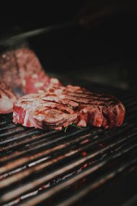 Close-up of meat on barbecue grill