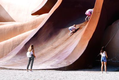 Rear view of friends