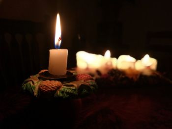 Close-up of lit tea light candles