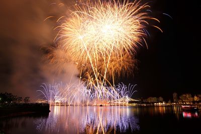 Firework display at night