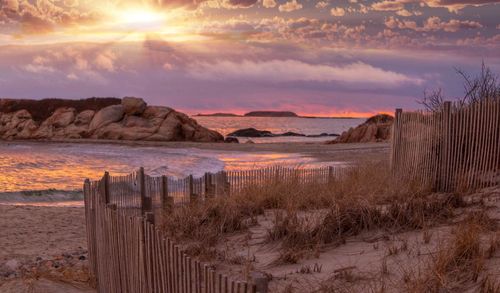 Scenic view of landscape against sky during sunset