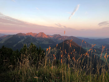 Scenic view of mountains against sky during sunset