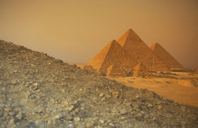 Ancient pyramids against clear sky