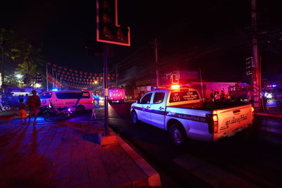 Cars on road at night