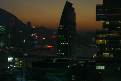 Illuminated buildings in city at night