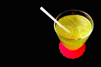 Close-up of drink against black background