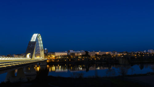 Reflection of illuminated buildings in water