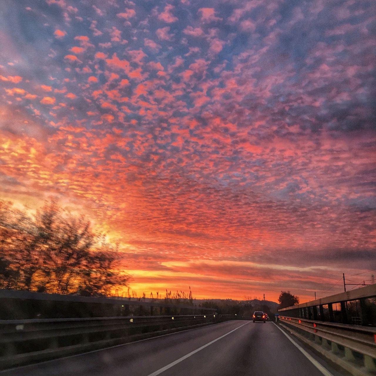 transportation, sunset, the way forward, road, sky, cloud - sky, diminishing perspective, orange color, vanishing point, dramatic sky, road marking, cloudy, car, cloud, highway, land vehicle, nature, beauty in nature, scenics, street