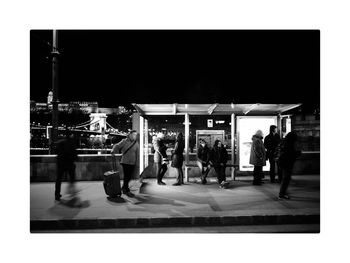 People in office building at night