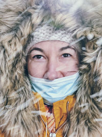 Portrait of young woman in winter