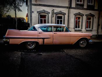 View of cars parked in front of building