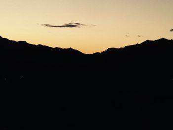 Scenic view of mountains at sunset