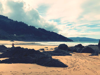 Scenic view of beach against sky